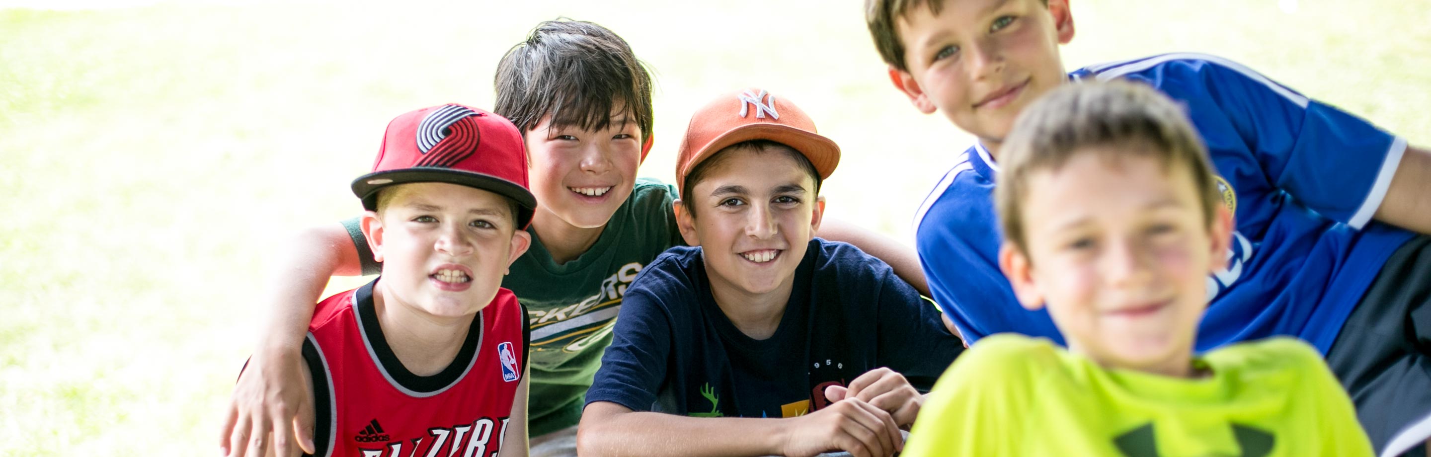 header-boys-picnic-table – Deer Mountain Day Camp